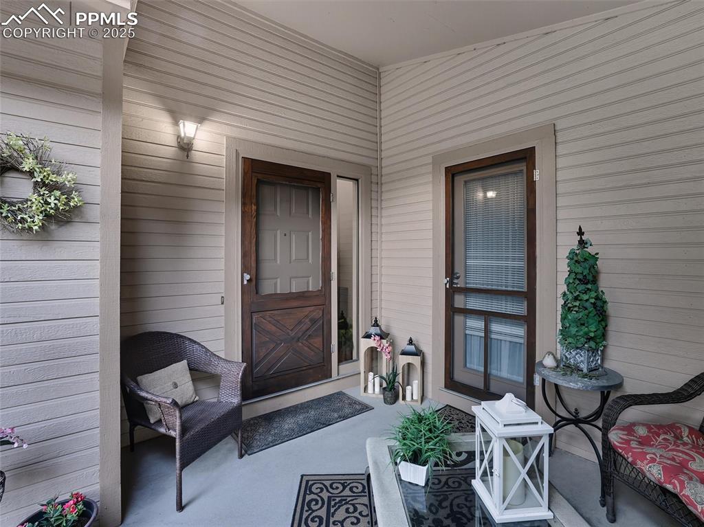 Image 4 of 36: Sanctuary vibe continues tucked away in a private front courtyard