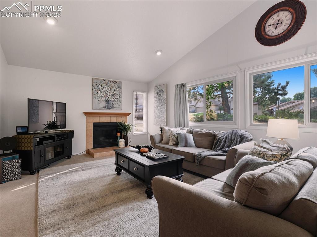 Image 8 of 36: Cozy up to this wood-burning fireplace on those cool Colorado evenings