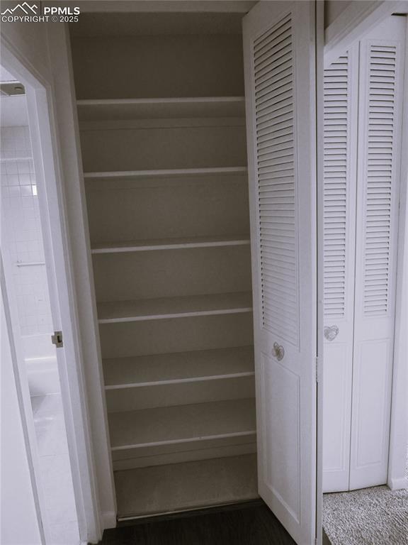 Image 15 of 25: Linen closet