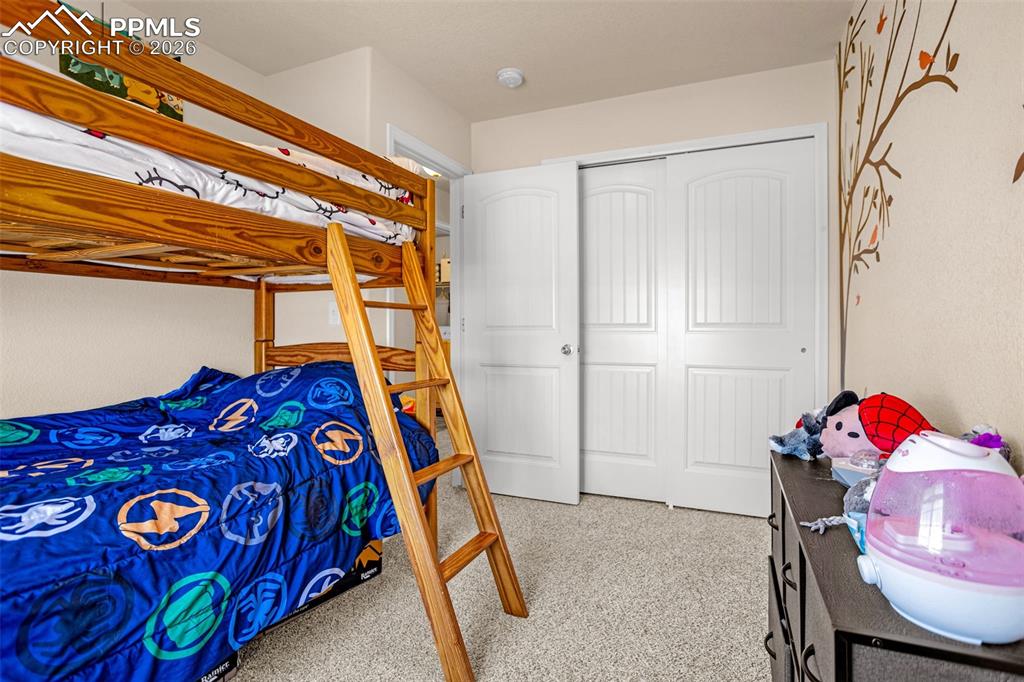 Image 12 of 30: Bedroom featuring a closet