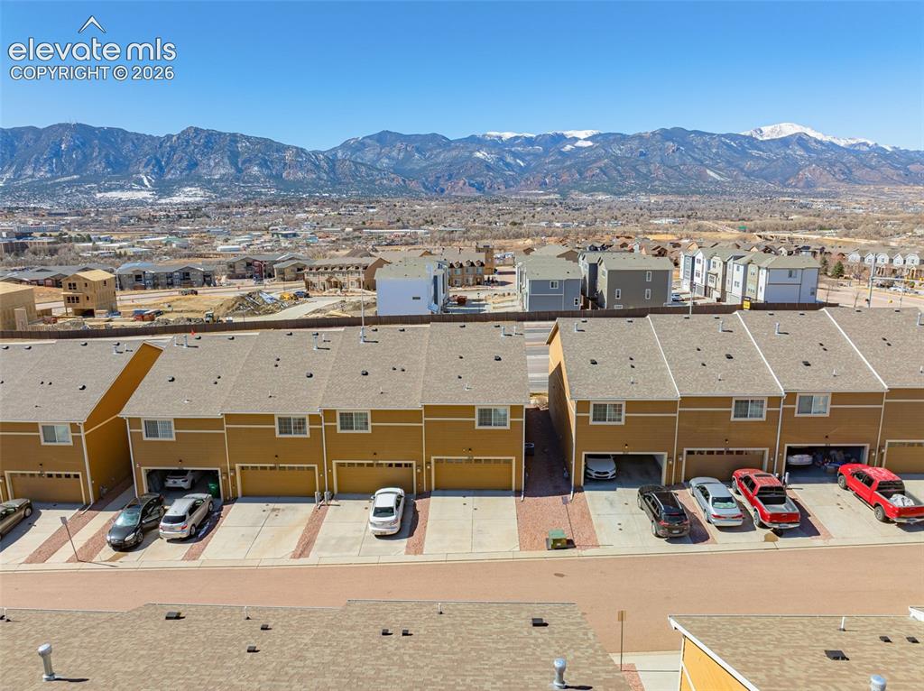 Image 32 of 38: Drone / aerial view of a mountain backdrop