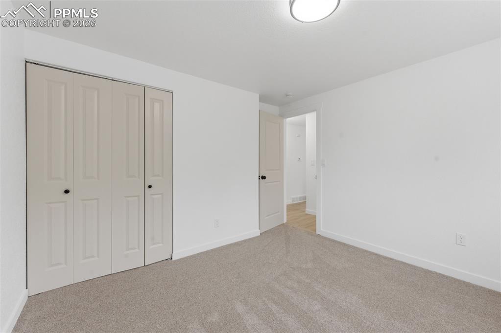 Image 19 of 28: Bedroom