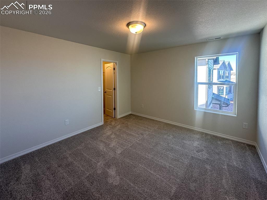 Image 24 of 34: Bedroom