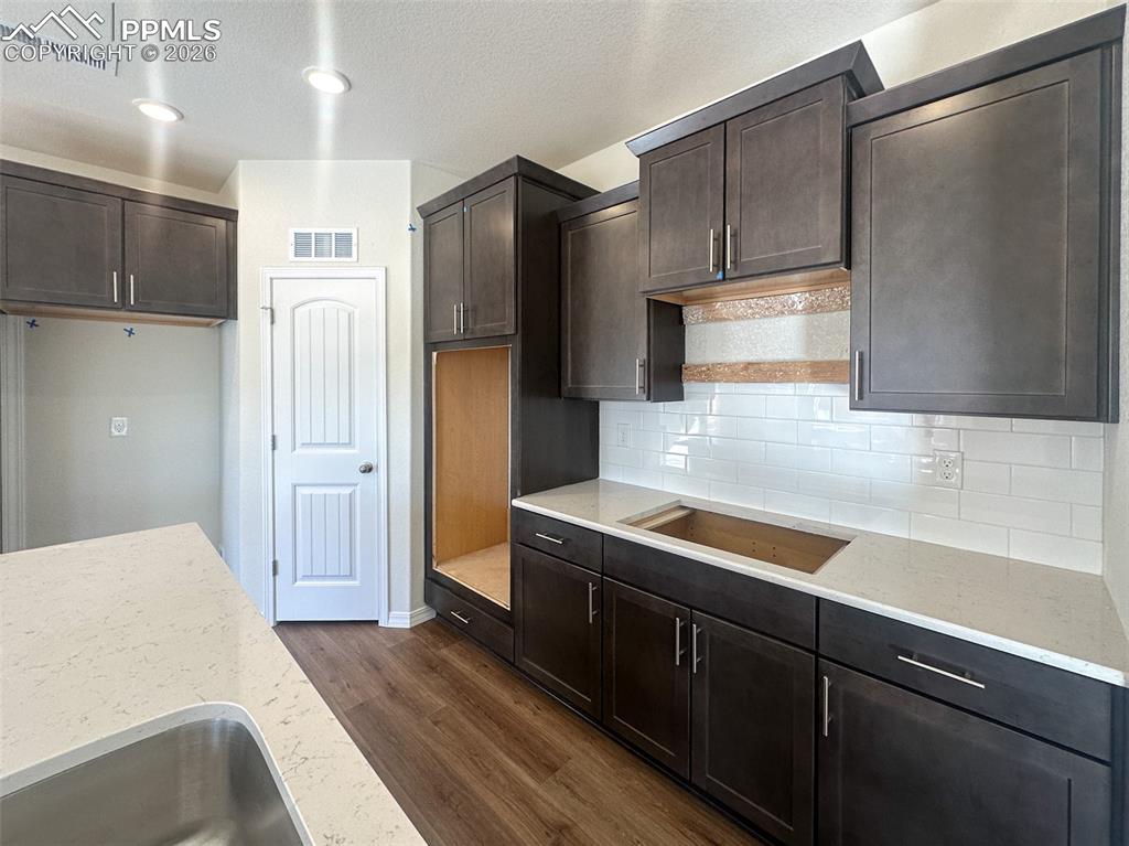 Image 5 of 34: Stainless steel double oven, microwave, gas range top and dishwasher includ