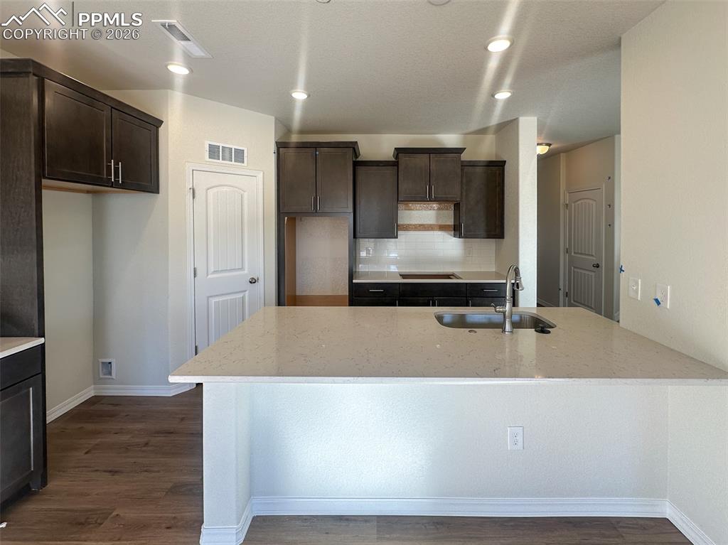 Image 7 of 34: Stainless steel double oven, microwave, gas range top and dishwasher includ