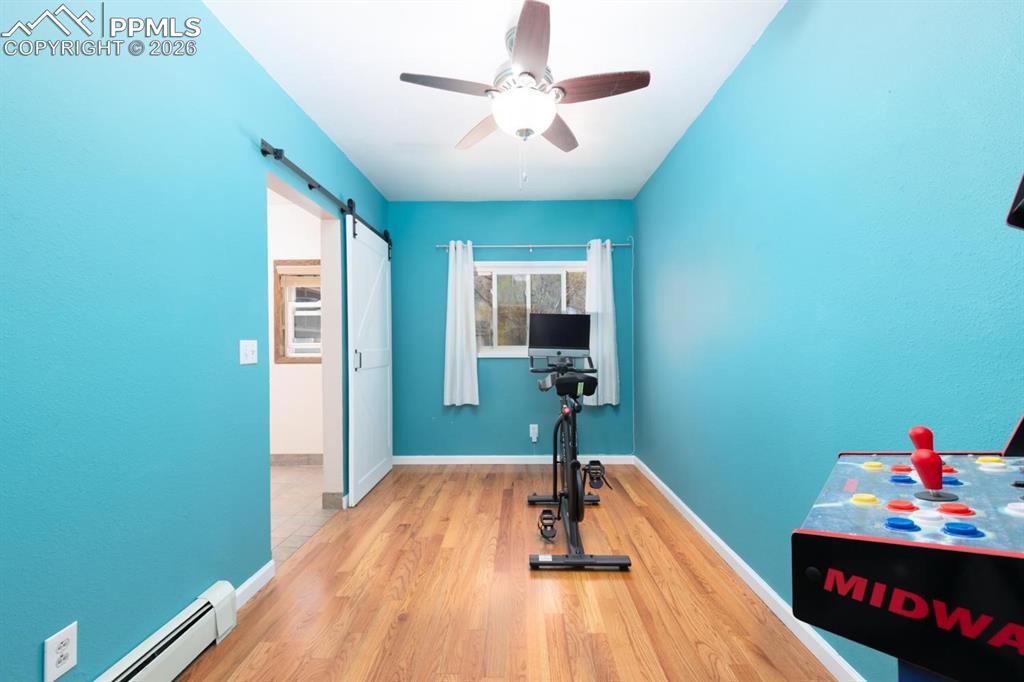 Image 15 of 34: Office or flex room located off of the entryway and leads to the laundry ro