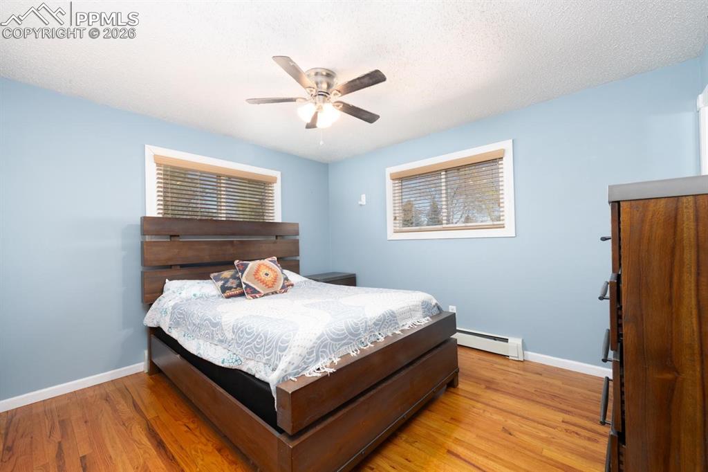 Image 18 of 34: Primary Bedroom and bathroom