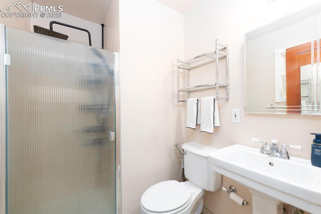 Image 20 of 34: Primary Bedroom and bathroom