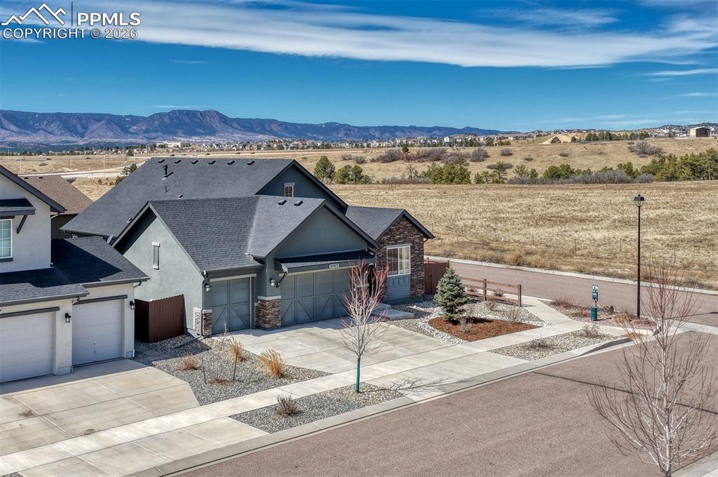 Caption: Sweeping mountain and USAFA Chapel views from the property