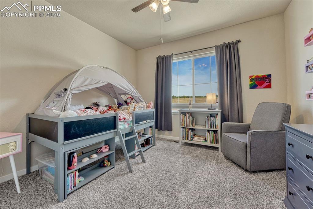 Image 15 of 46: Bedroom with peaceful views.