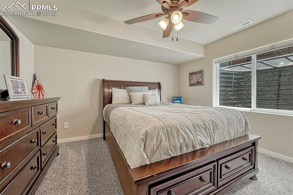 Image 26 of 46: Flexible living spaces for guests, work, or play.