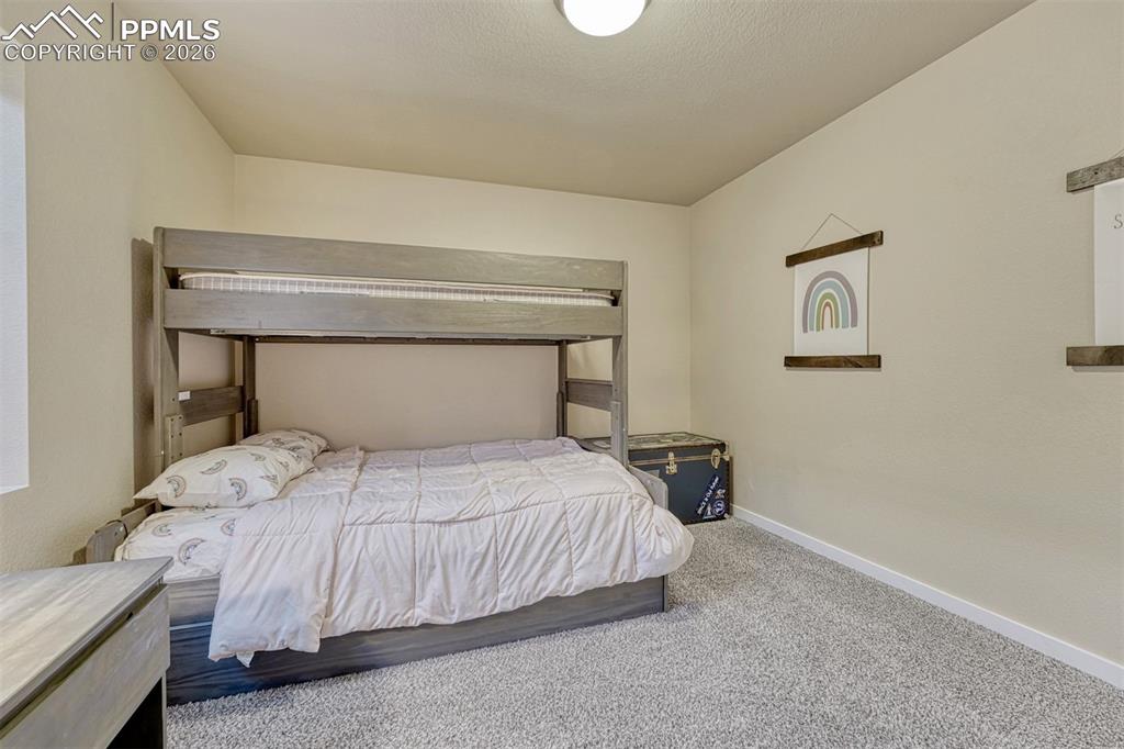 Image 29 of 46: Basement designed with higher ceilings for comfortable living