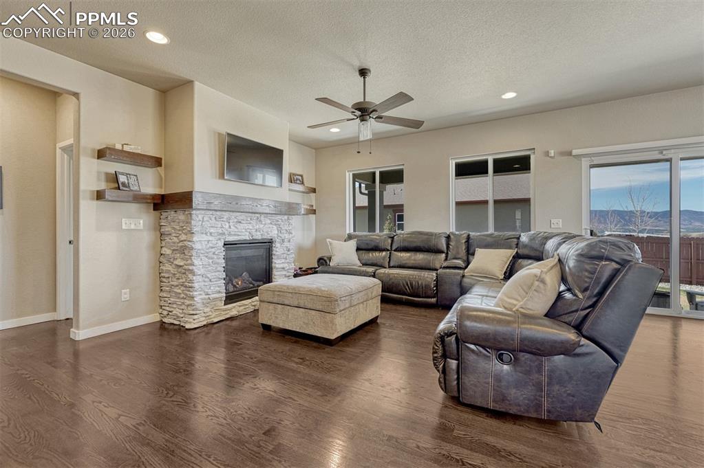 Image 31 of 46: Open-concept living with newly finished hardwood floors