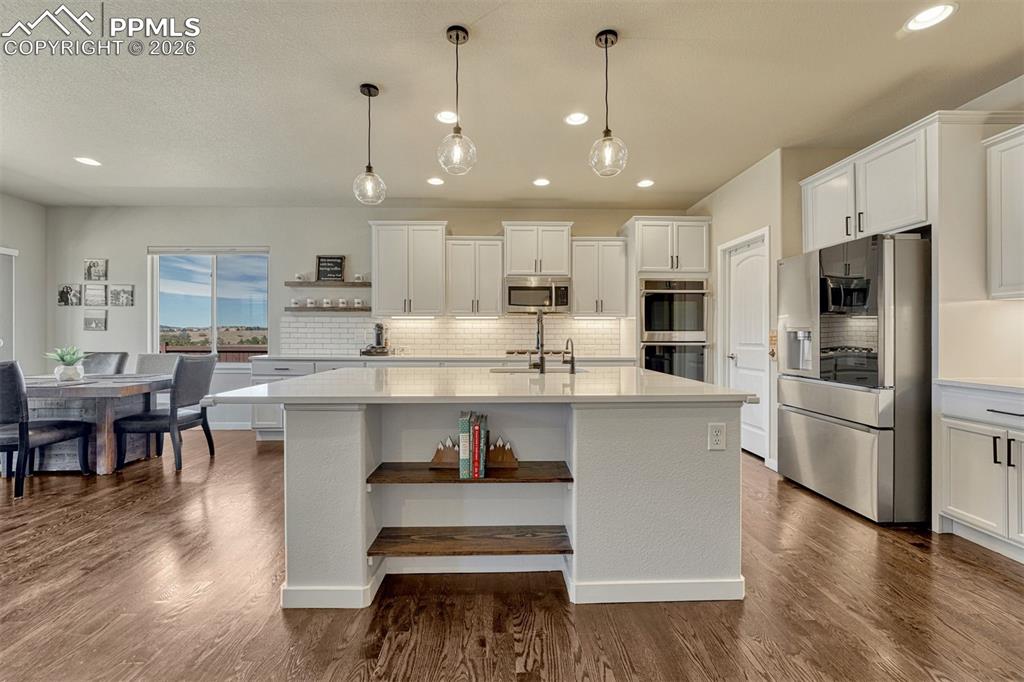 Image 34 of 46: Ideal layout for gatherings with open kitchen and living areas