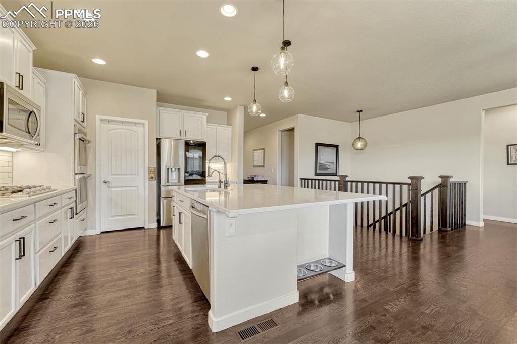 Image 4 of 46: 5-burner gas range and thoughtful upgrades throughout