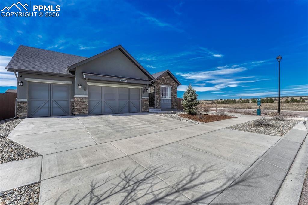 Image 44 of 46: Oversized 3-car garage.