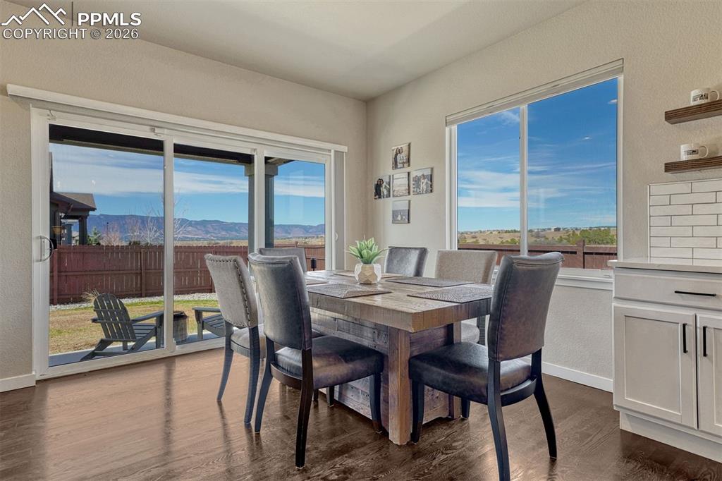 Image 5 of 46: Indoor-outdoor living with easy access to covered patio