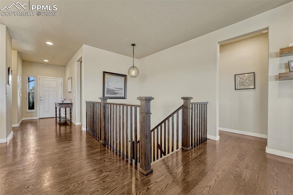 Image 6 of 46: Open-concept living with newly finished hardwood floors