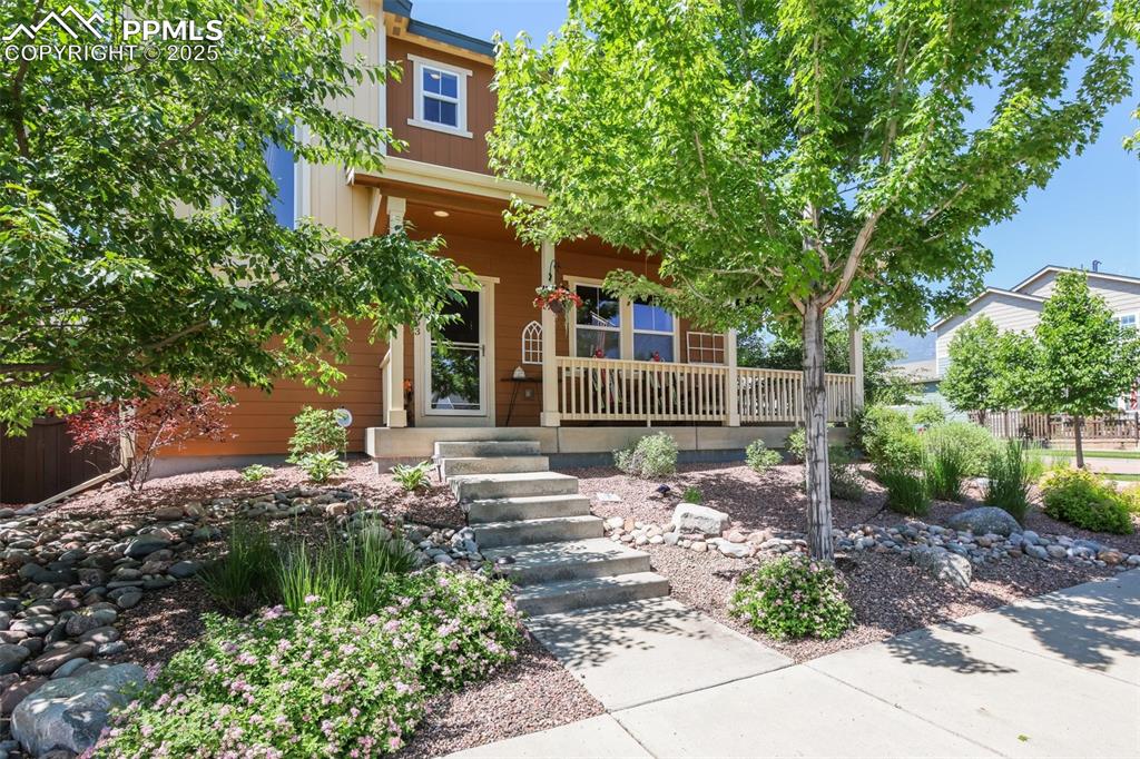 Image 3 of 50: View of front of home featuring a porch