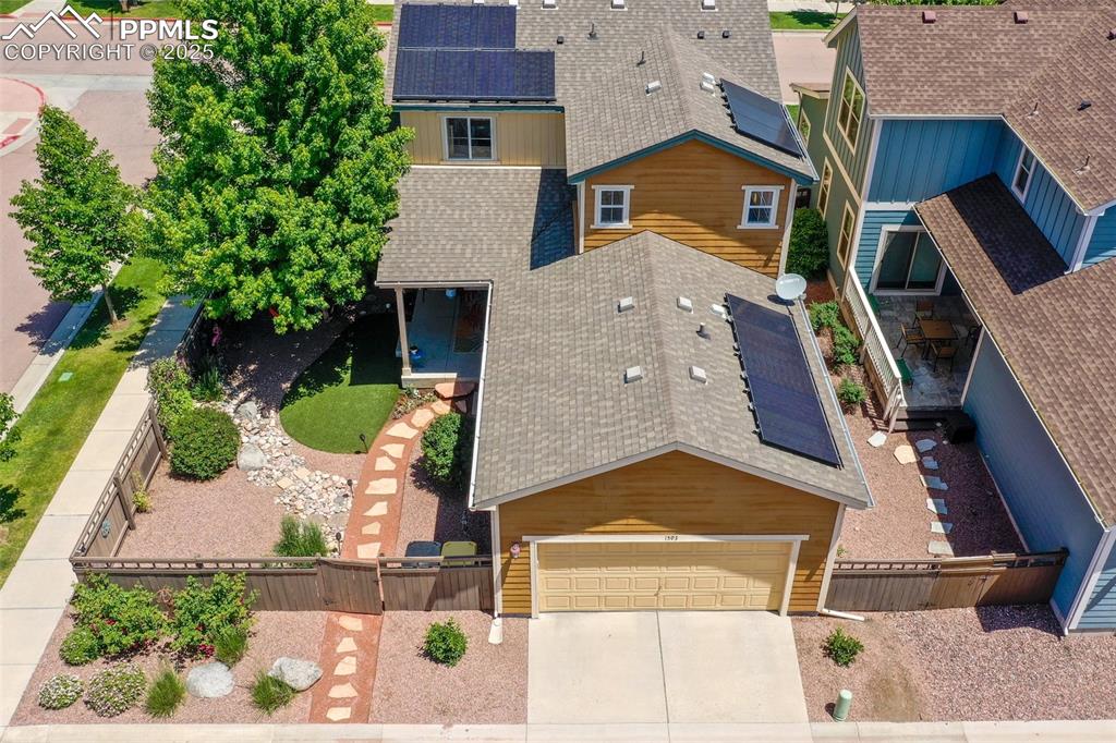Image 5 of 50: Aerial view of property and surrounding area