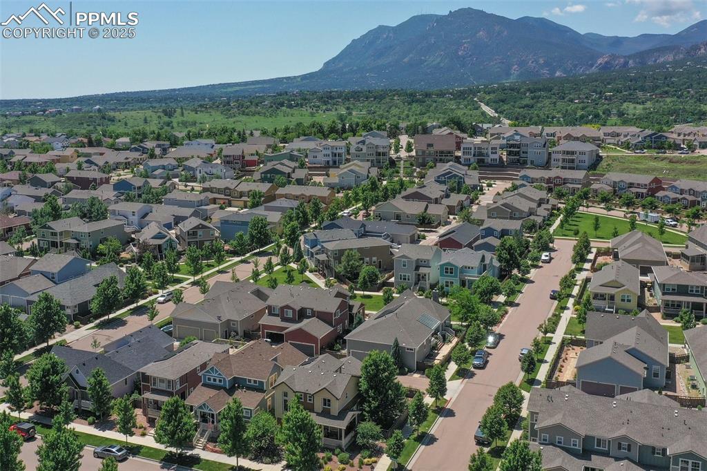 Image 50 of 50: View of property location with a mountainous background and nearby suburban