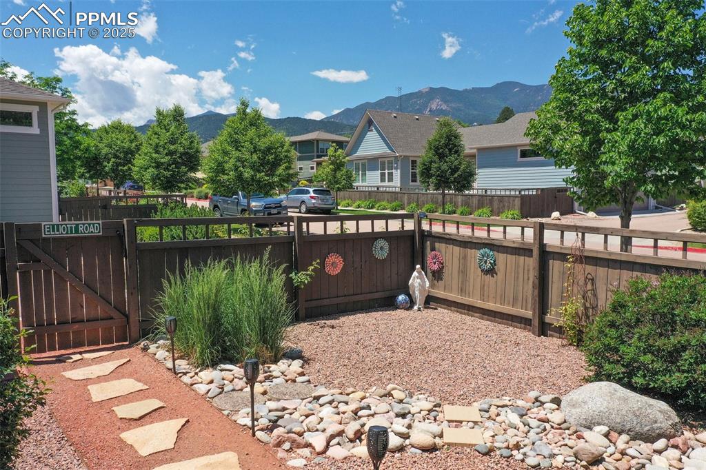 Image 9 of 50: View of yard featuring a mountain view
