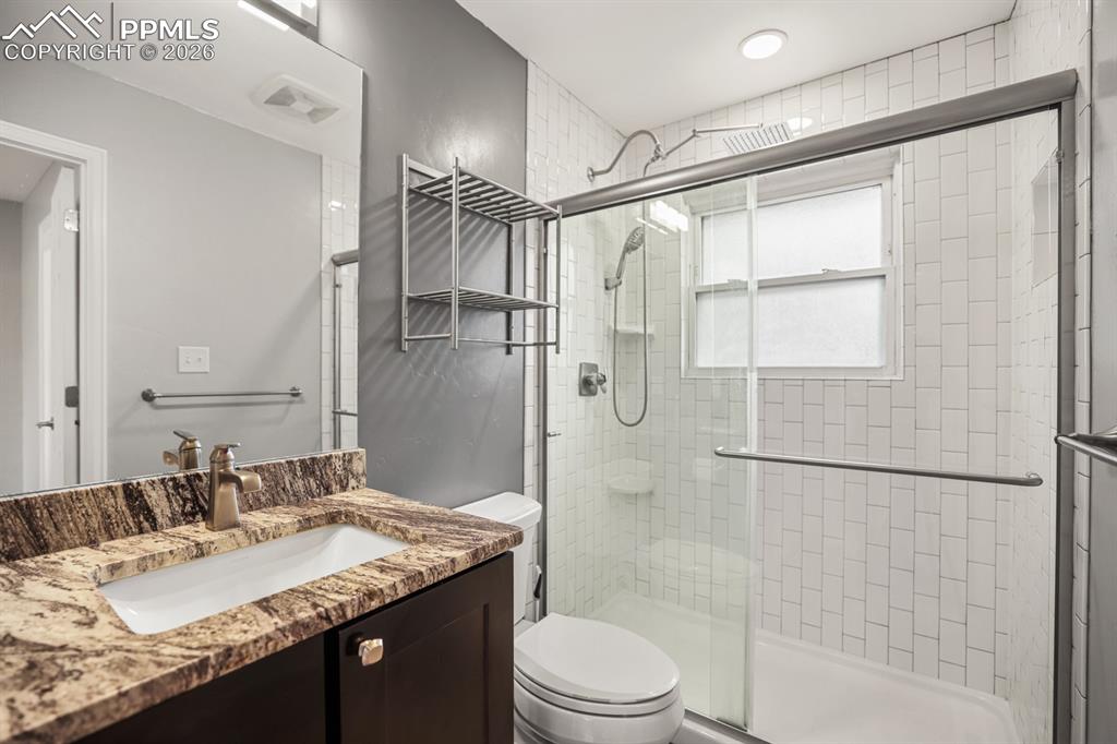 Image 16 of 37: Main level bathroom