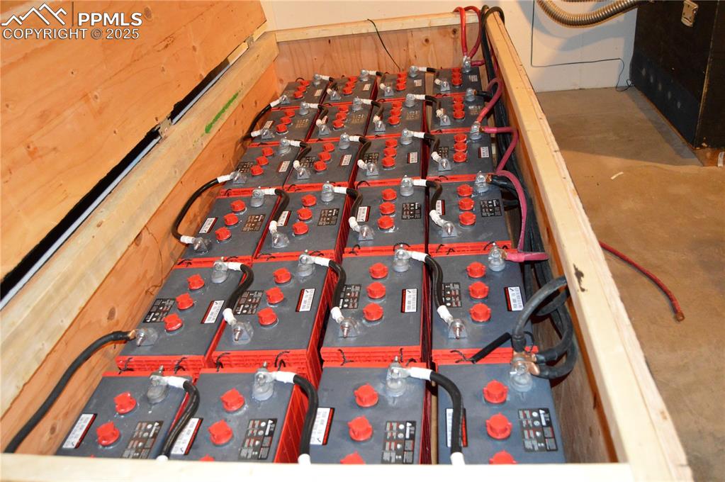 Image 37 of 50: Battery Bank in unfinished basement