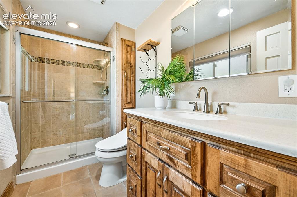 Image 20 of 50: Attached bath with walk in shower