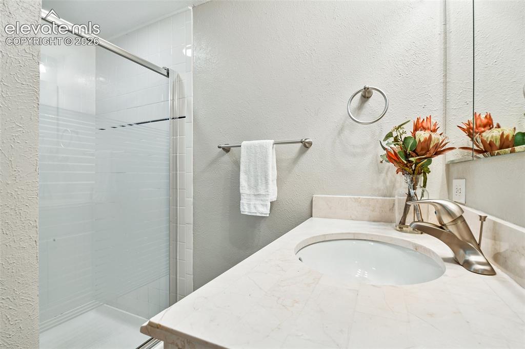 Image 31 of 50: 3/4 bath in basement