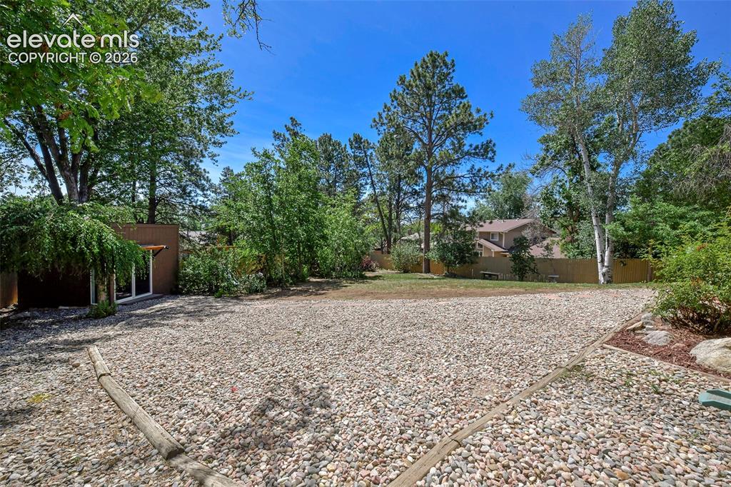 Image 34 of 50: Enormous private backyard with...