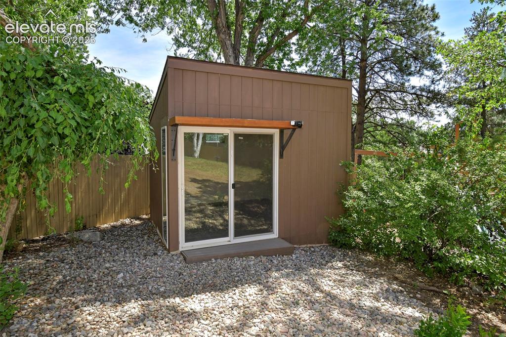 Image 35 of 50: Large shed that has been used as a home office