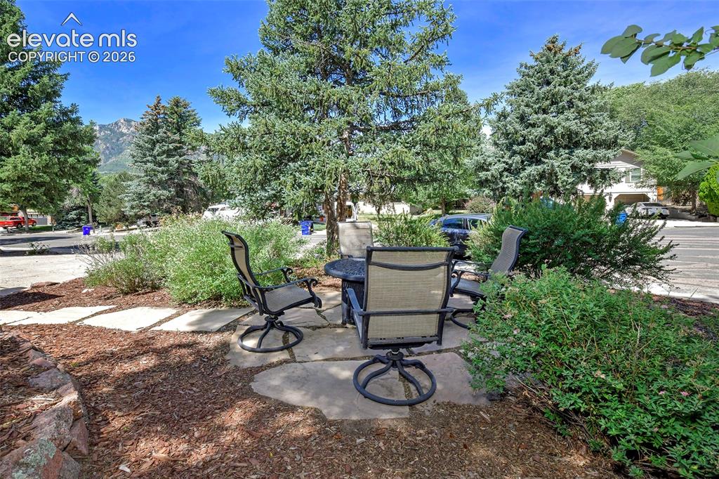 Image 44 of 50: Hidden front patio