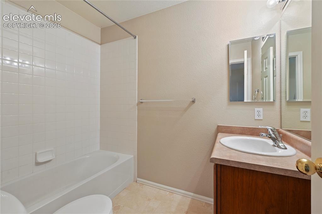 Image 19 of 29: Bathroom #3 is a full bathroom upstairs just outside both of the secondary 