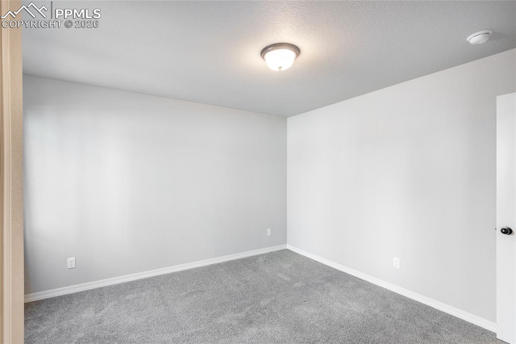 Image 32 of 37: Bedroom