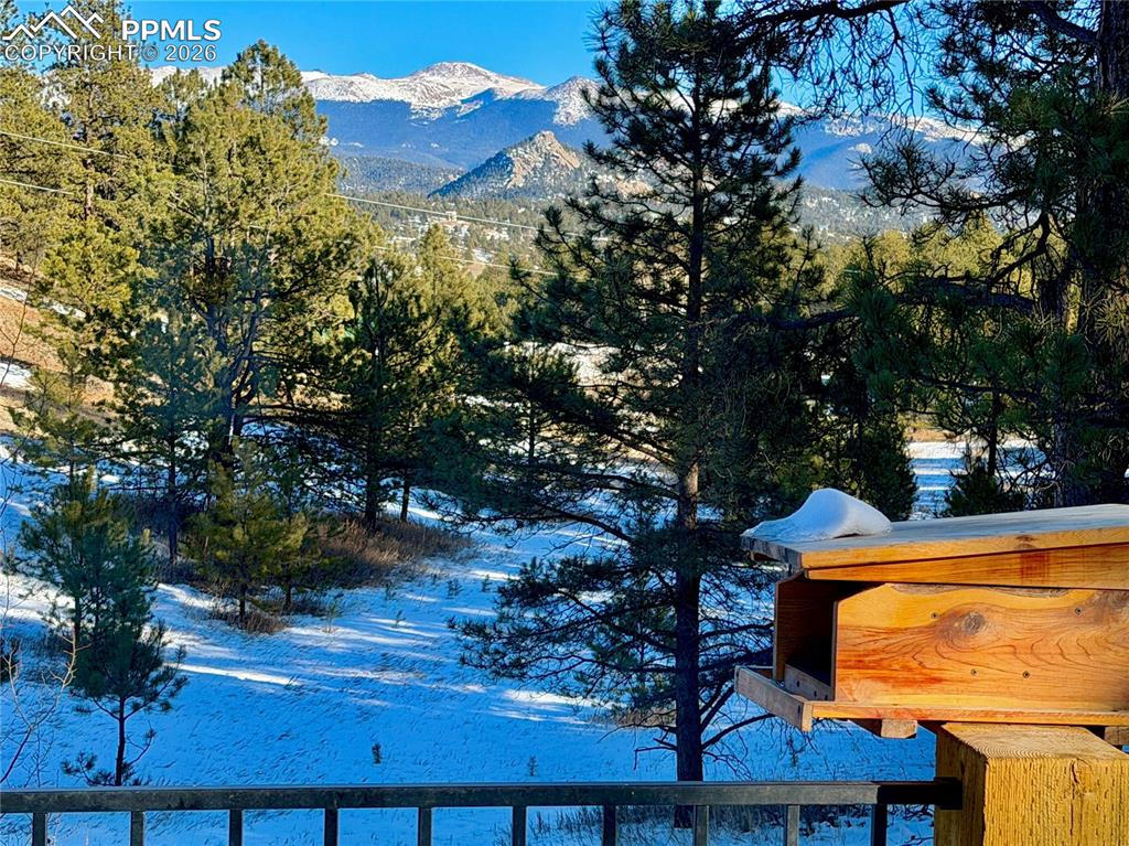 Image 35 of 50: View fron Deck and Living room 