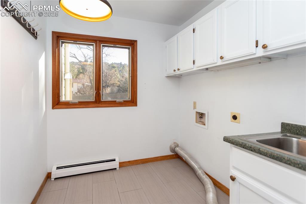 Image 17 of 50: Main level laundry room