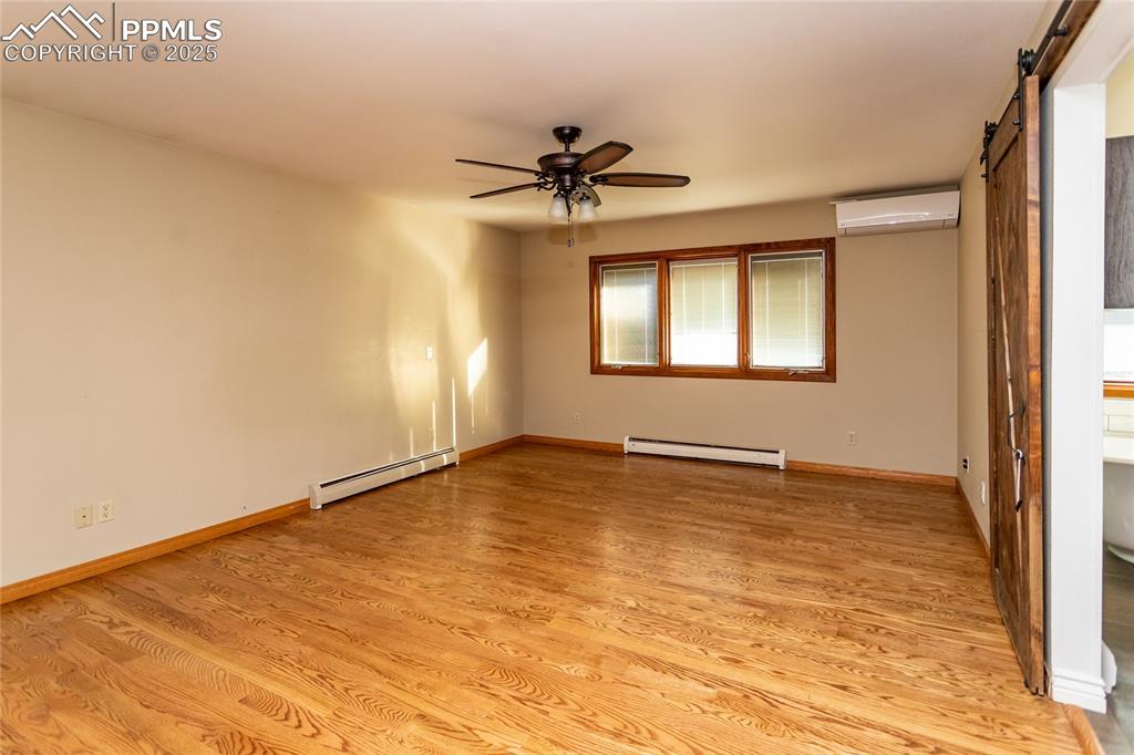 Image 26 of 50: Spacious master with attached 5-piece bath