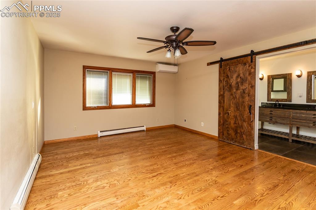 Image 27 of 50: Primary Bedroom