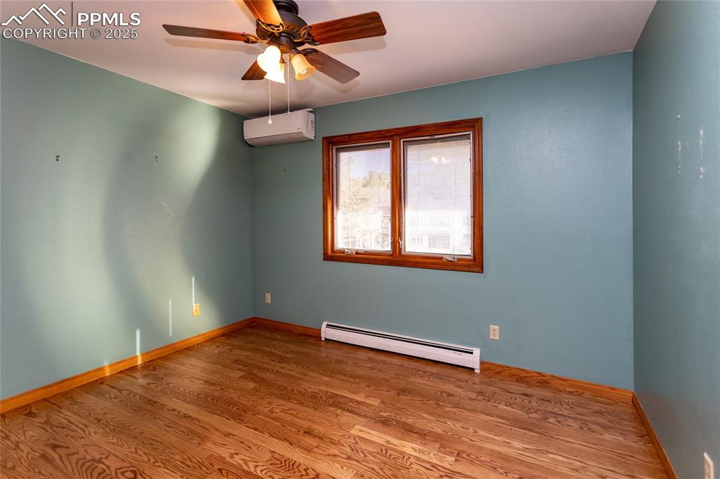 Image 35 of 50: Upper level Bedroom