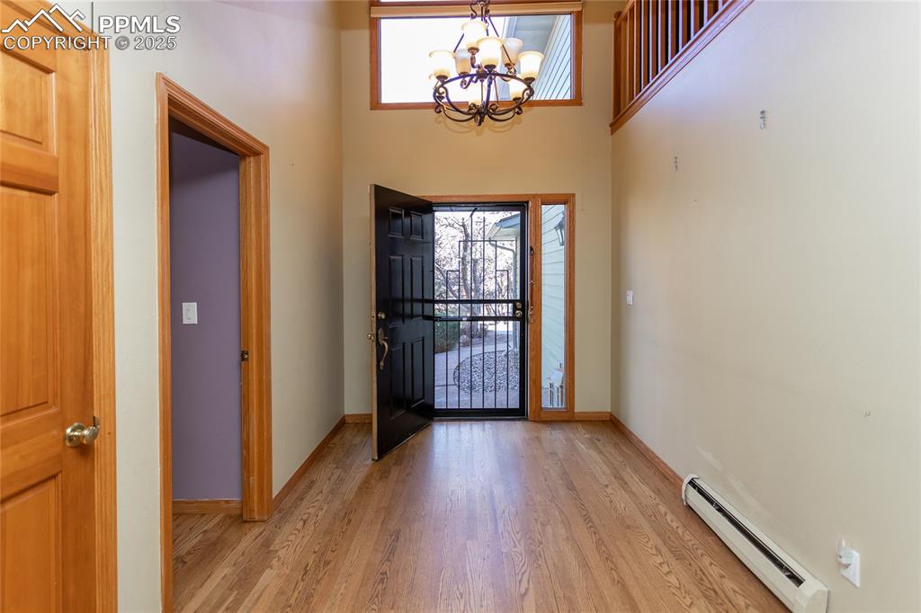 Image 4 of 50: Complete with wood floors