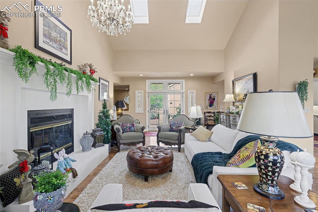 Image 12 of 50: Elegant comfort awaits you and your guests in this spacious living room fea