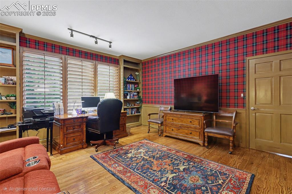 Image 28 of 50: Adjacent to the hearth room is the laundry, oversized pantry and garage acc