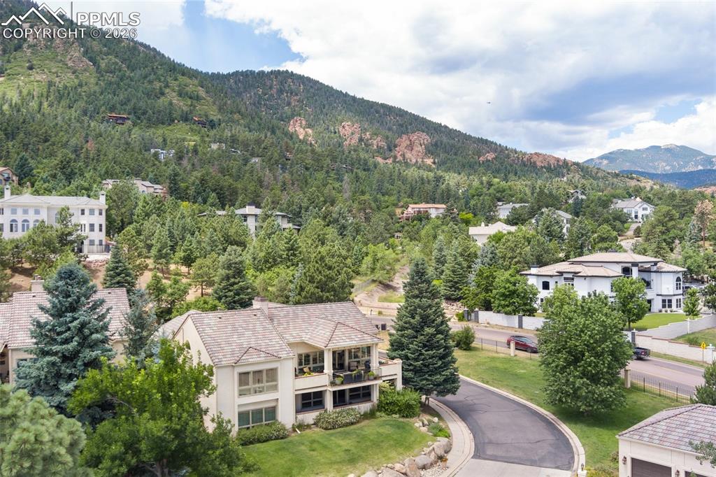 Image 30 of 50: Main level bedroom 2 currently used as an office.  