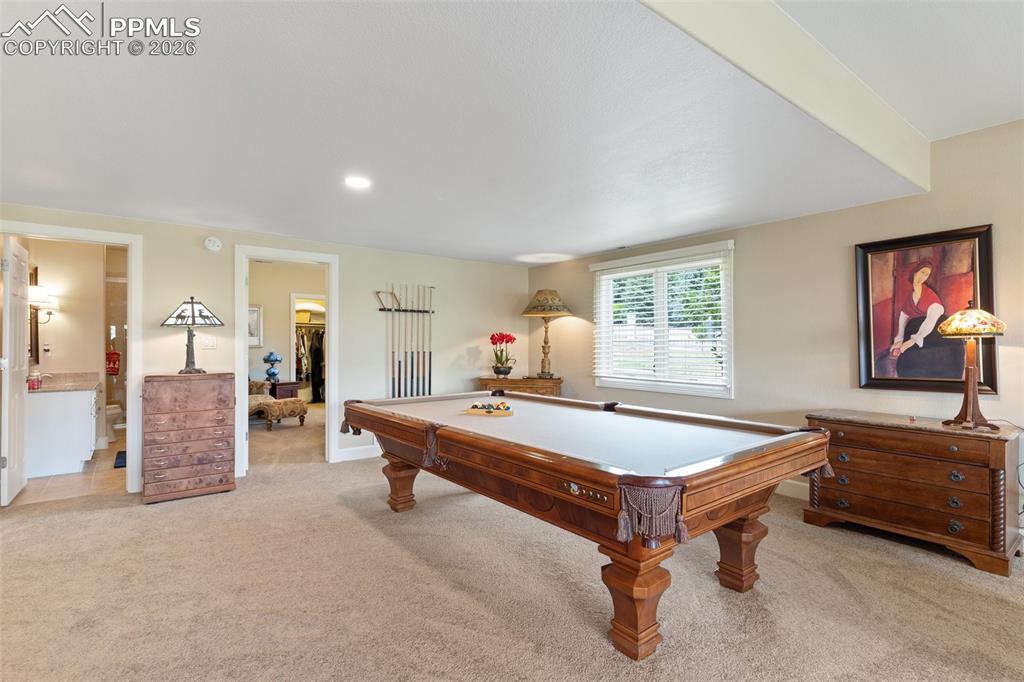 Image 40 of 50: YES, there is plenty of room for a pool or game table. This pool table is e