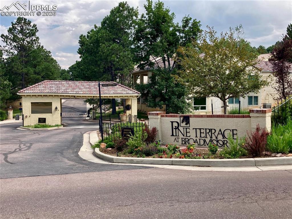 Image 46 of 50: Basement bedroom 4 boasts access to the lower level patio. The adjacent ful