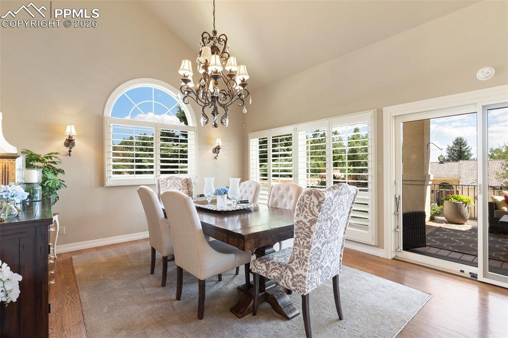 Image 7 of 50: Enjoy that special meal in the formal dining room with access to the large