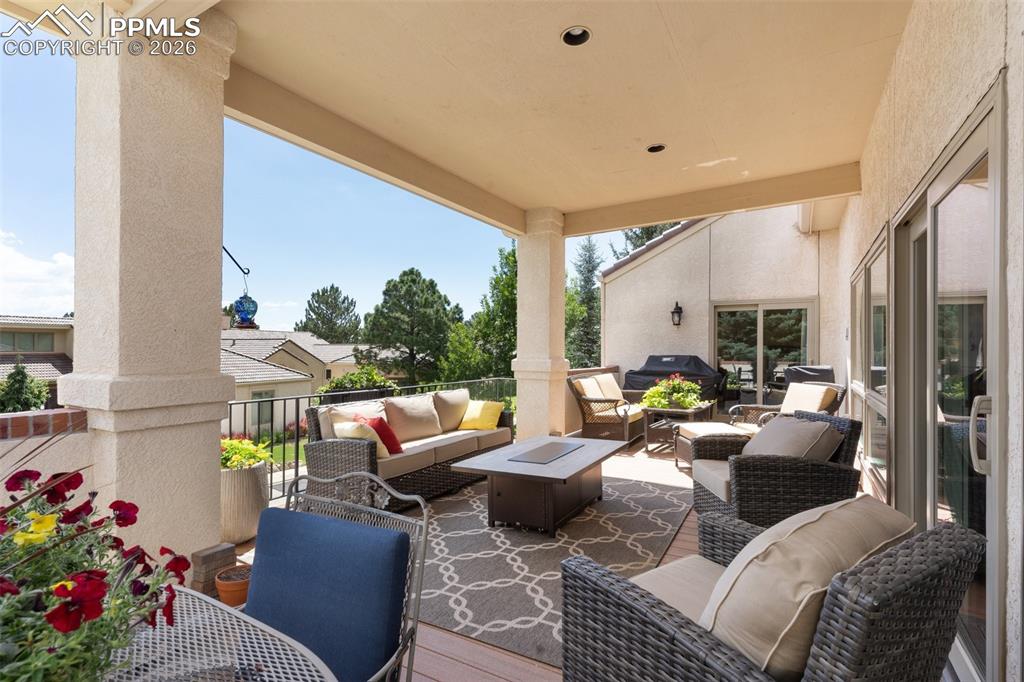Image 9 of 50: Upper level patio, view 2. The master bedroom is accessed via the slider at