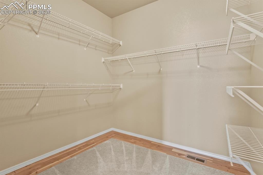 Image 20 of 42: Primary bedroom closet