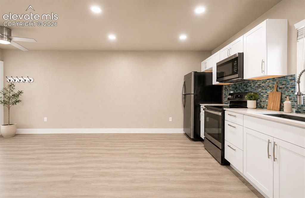 Image 11 of 46: ADU kitchen/living